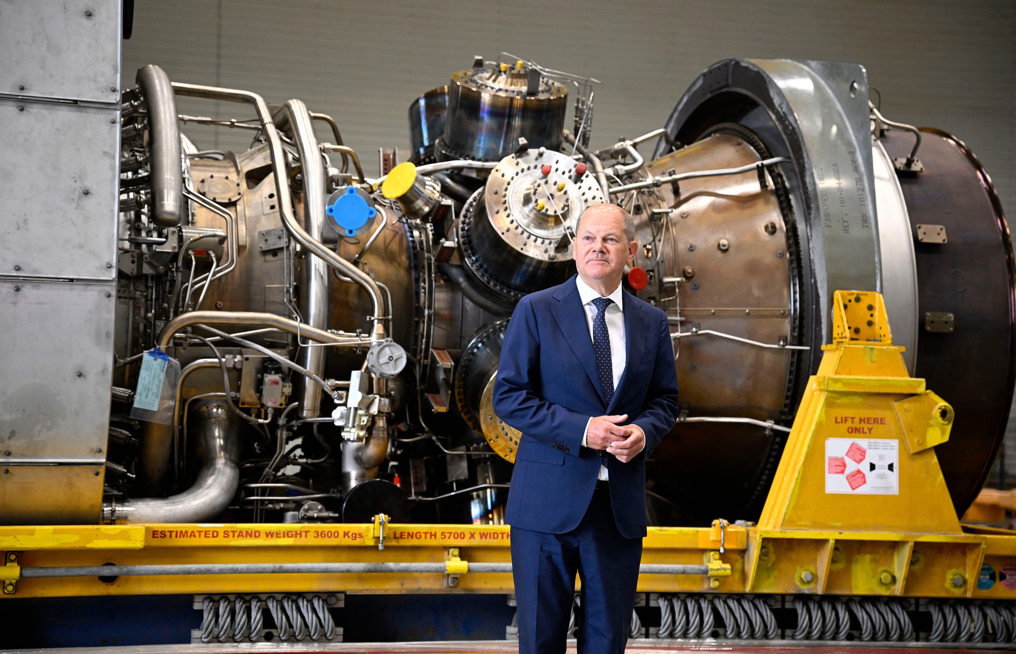 Olaf Scholz in front of a Nord Stream 1 pipeline turbine at the&nbsp;Siemens Energy plant in Muelheim an der Ruhr,&nbsp;Germany, on Aug. 3.