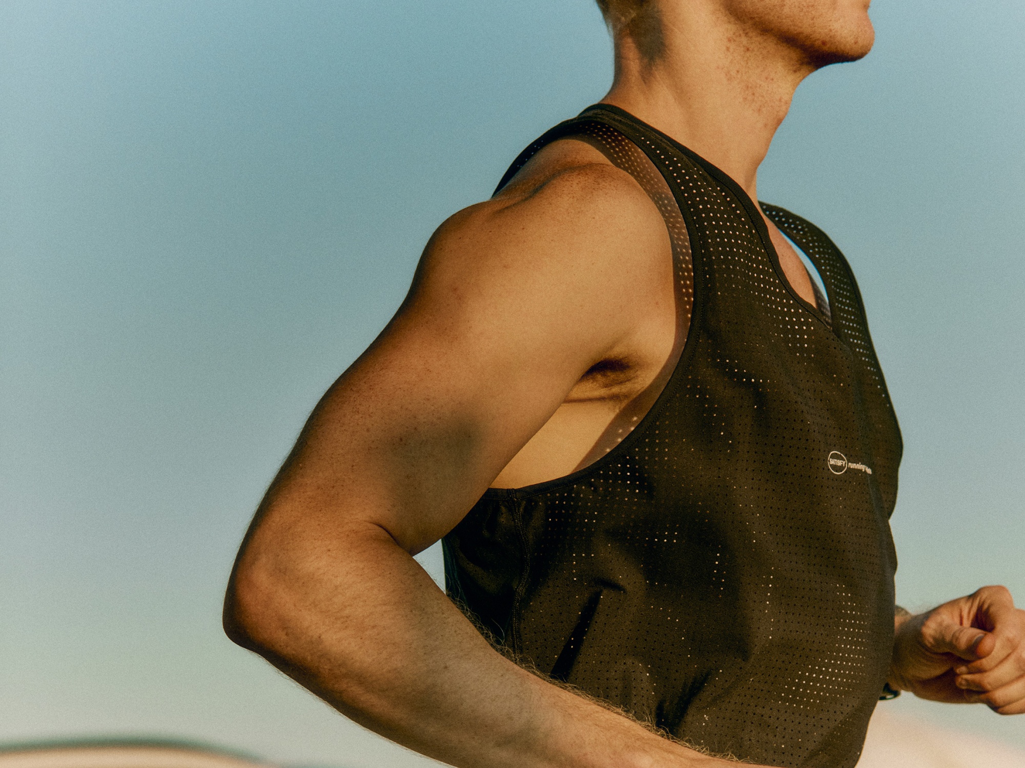 Bourbon’s running gear includes a Space-O singlet from Satisfy. Photographer: Philip Vukelich for Bloomberg