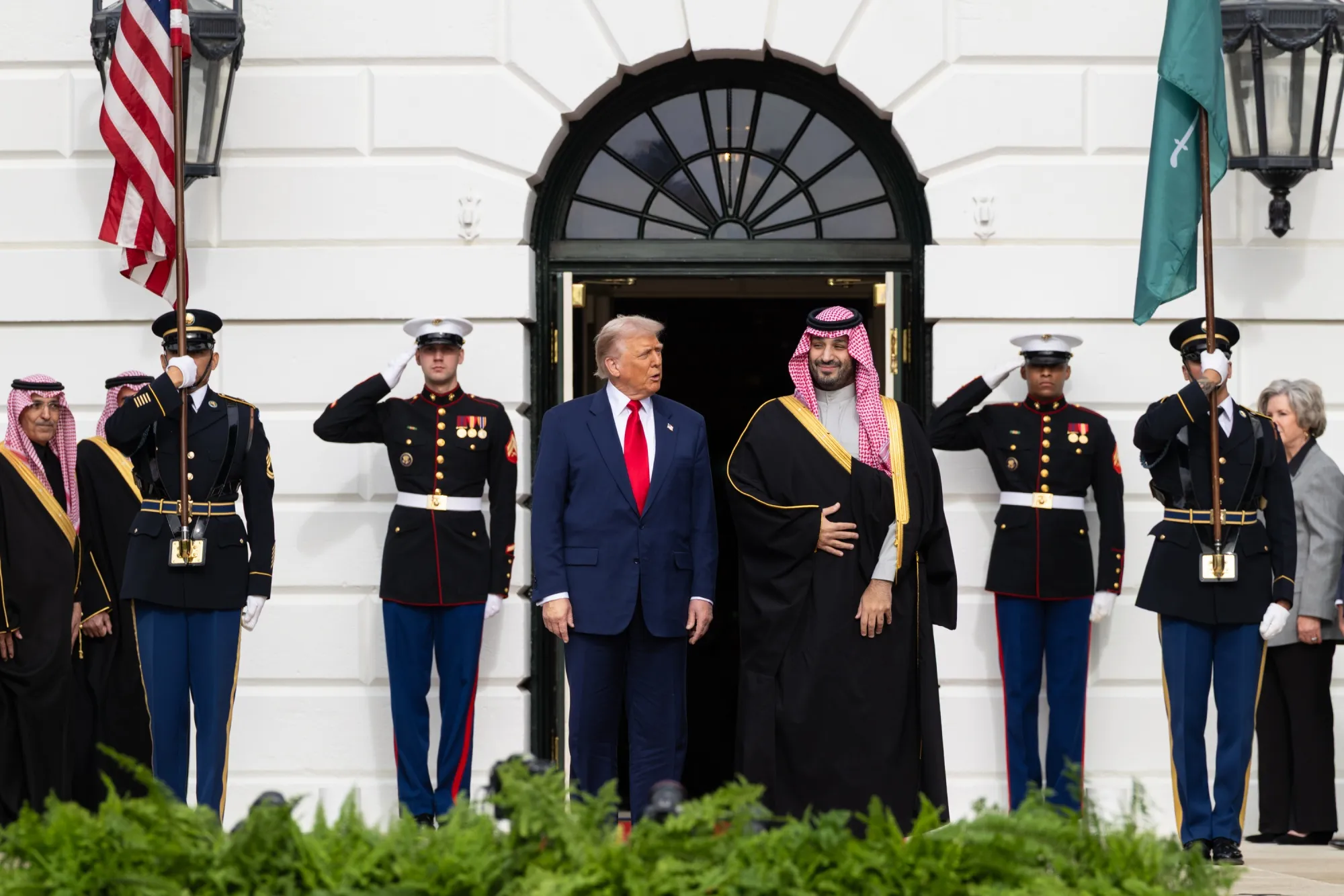 This is the picture of US President Donald Trump and Mohammed bin Salman, Saudi Arabia's crown prince, center right, during a ceremony on the South Lawn of the White House.