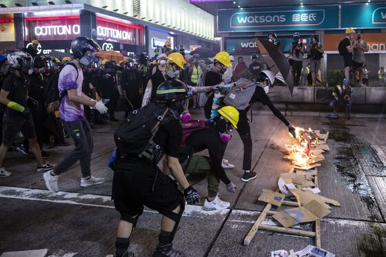 Police Fire Tear Gas to Protect China Office: Hong Kong Update