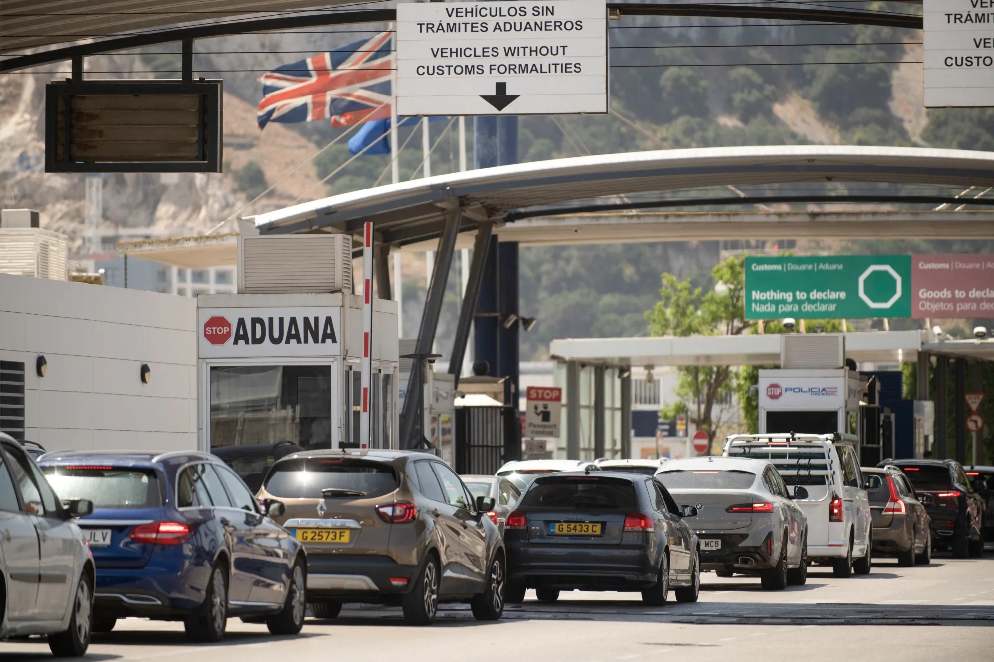 Vehicles cross the border from Spain into Gibraltar in la Linea de la Concepcion, Spain, in June.&nbsp;