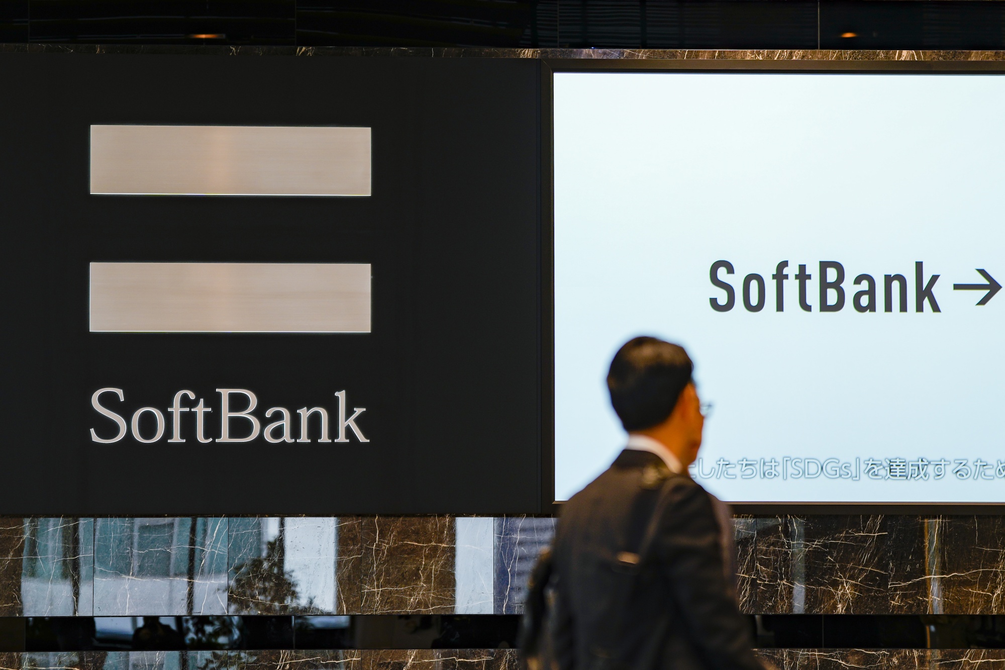 The SoftBank Group logo outside the company's headquarters in Tokyo. Photographer: Toru Hanai/Bloomberg