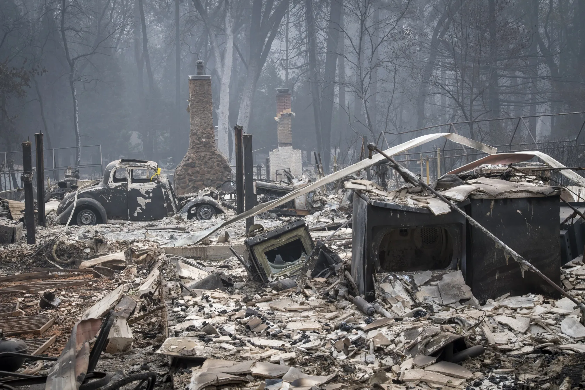 Burned-out homes and a vehicle stands in Paradise, California, on&nbsp;Nov. 15, 2018.&nbsp;