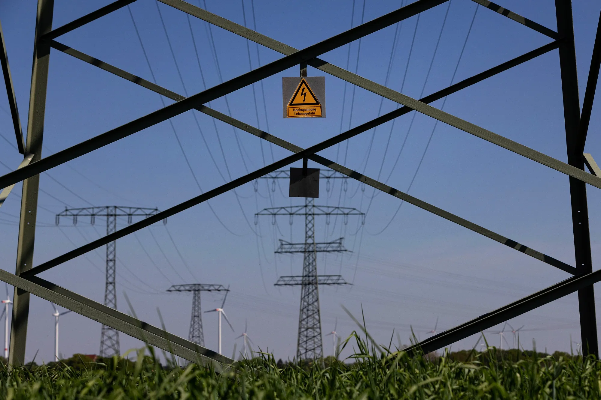A high-voltage warning sign on an electricity pylon in Berlin.