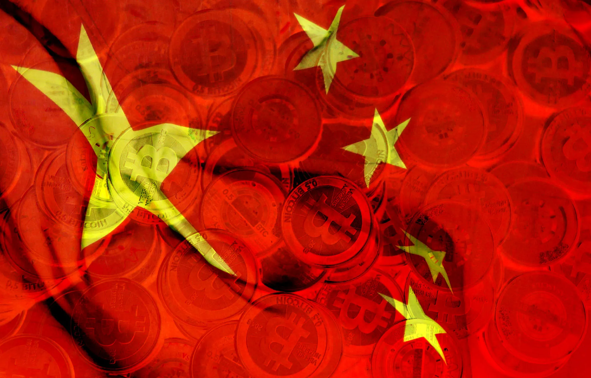 中国がビットコイン取引所の取引停止求める、月末が期限－関係者 - Bloomberg