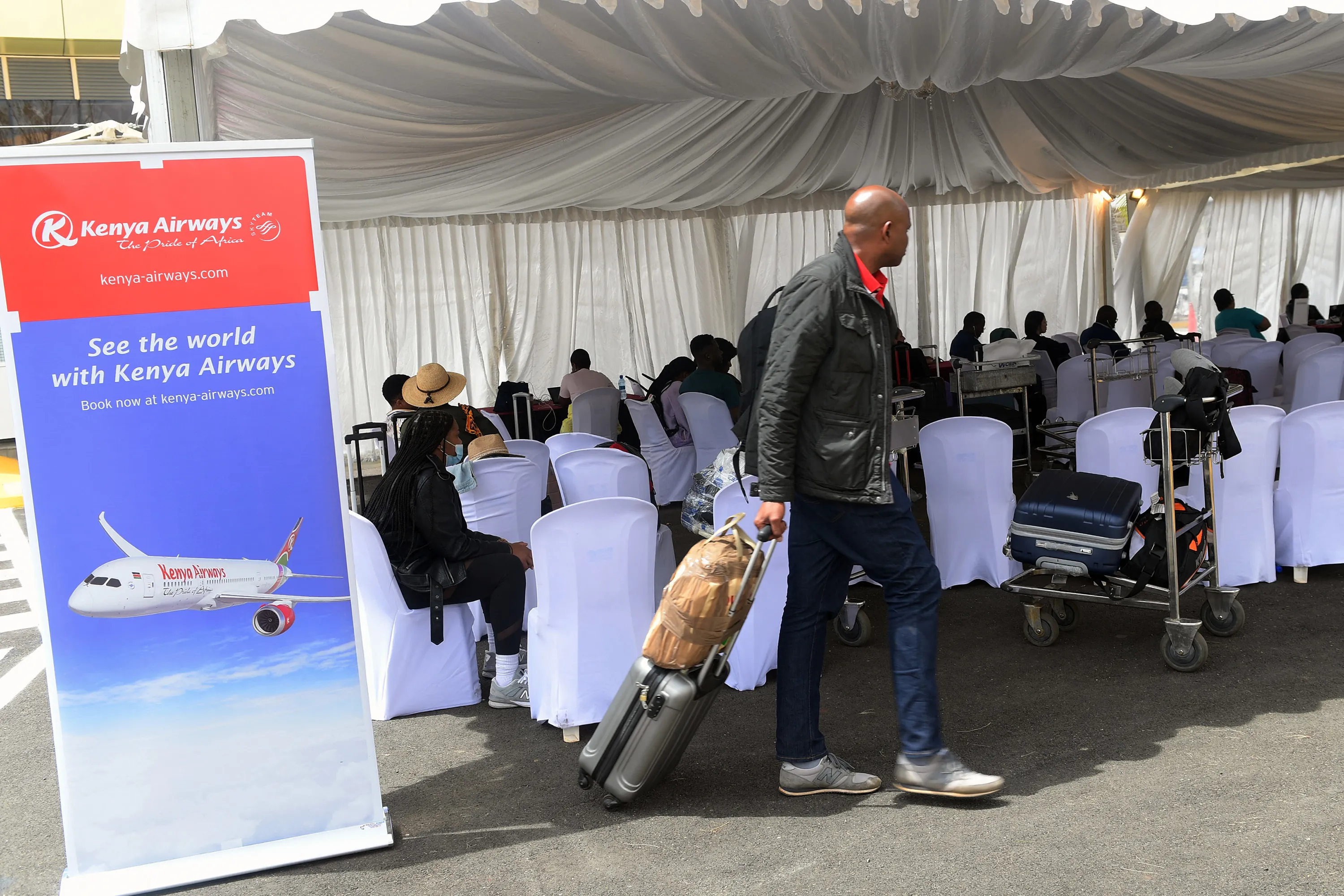A passenger at a Kenya Airways help desk during a pilot strike&nbsp;at the Jomo Kenyatta International airport in Nairobi, Kenya, on Nov. 6.