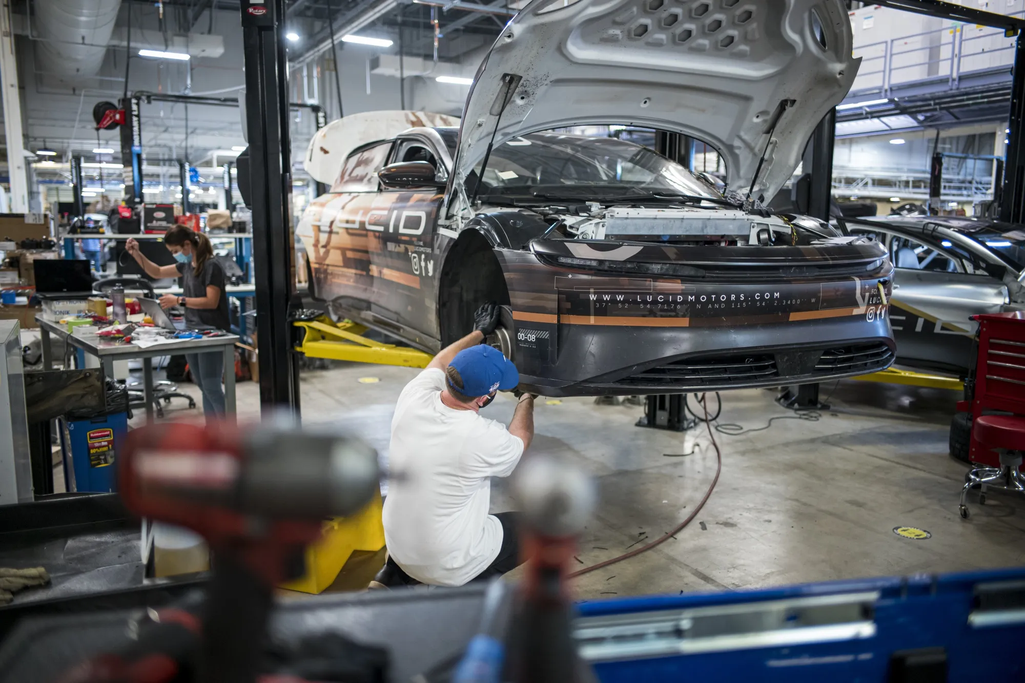 Workers assemble the Lucid Air prototype electric vehicle, manufactured by Lucid Motors Inc., at the company's headquarters in Newark, California, U.S.