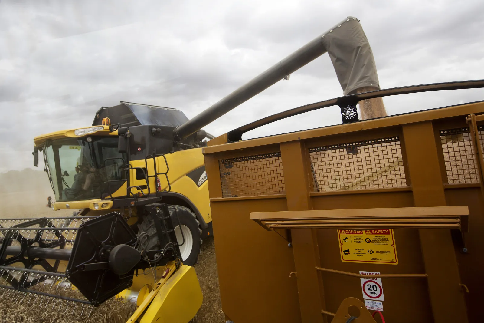 U.K. Wheat Harvest Using New Holland Agriculture Farming Machinery