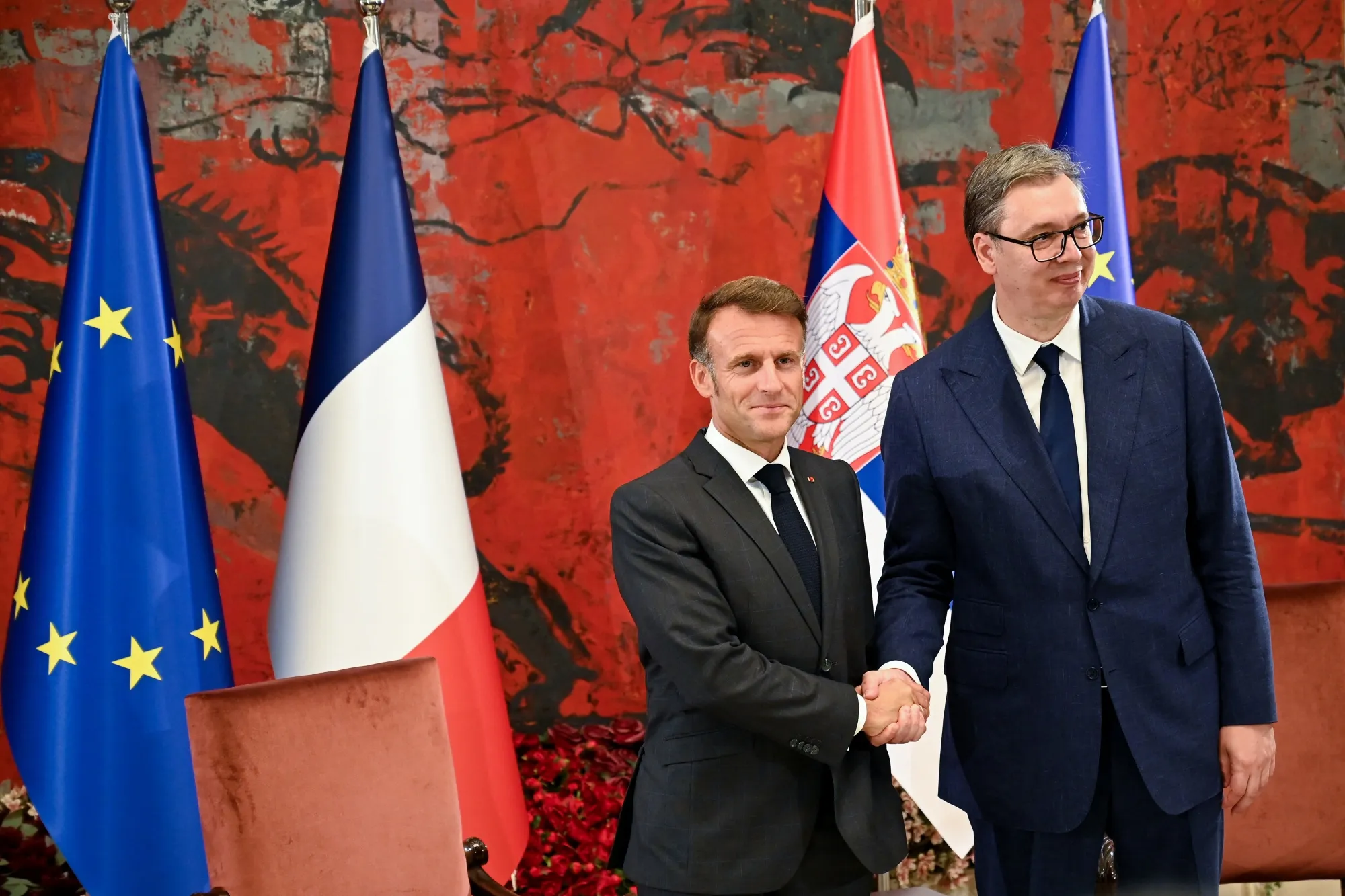 Emmanuel Macron and&nbsp;Aleksandar Vucic&nbsp;shake&nbsp;hands at the Palace of Serbia in Belgrade on Aug. 29.