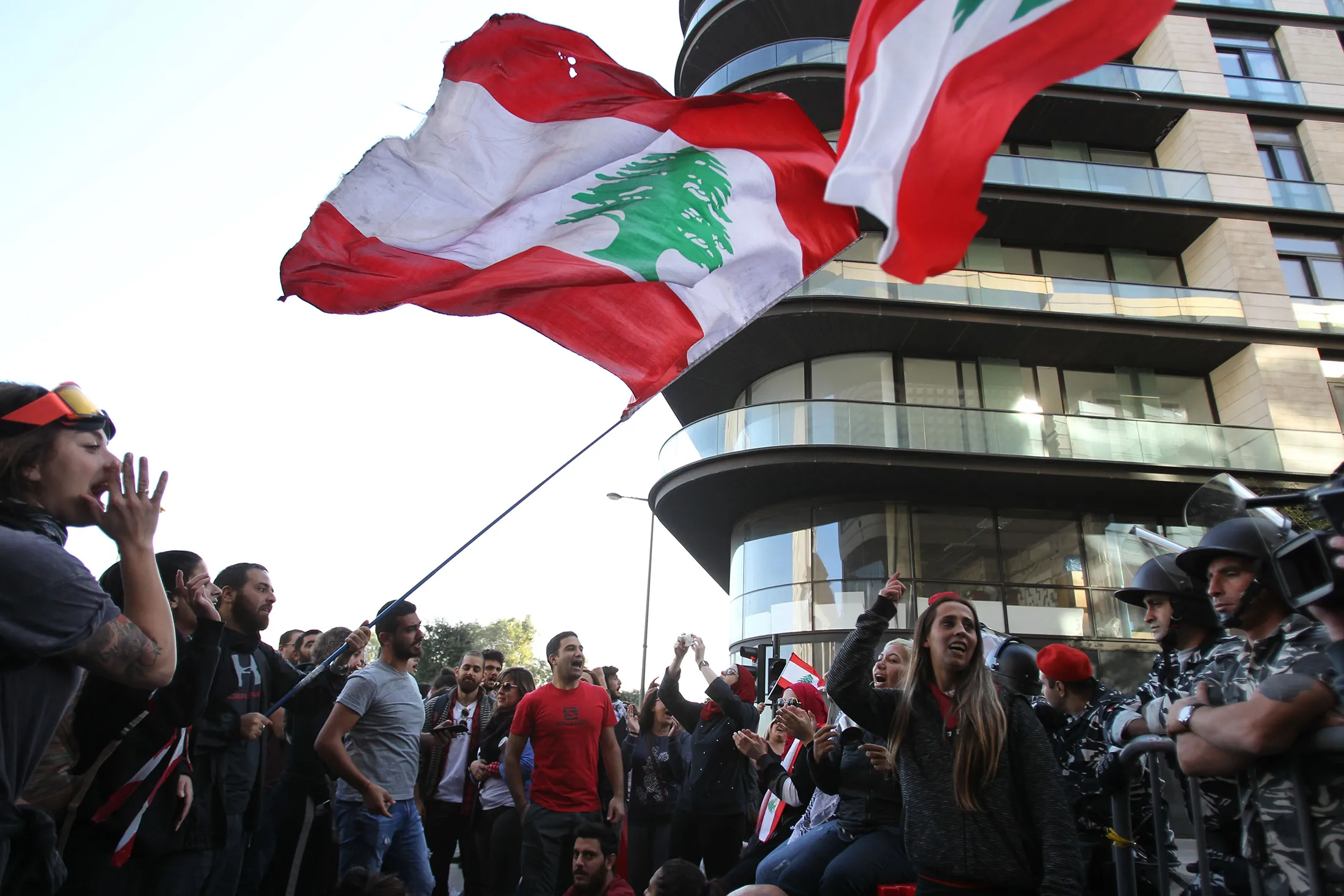 Lebanese anti-government protesters shout slogans in Beirut on Nov. 19.