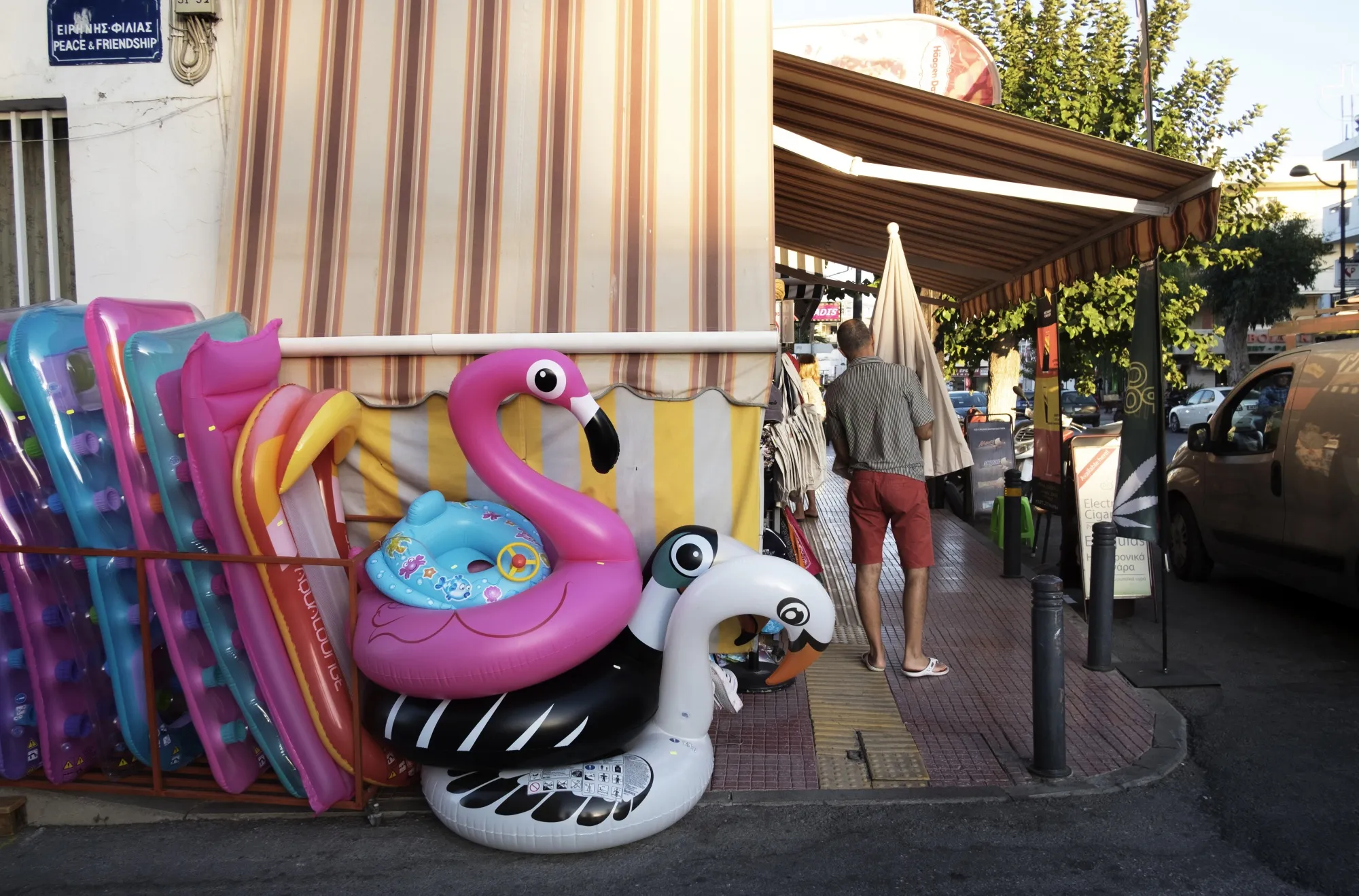 Flamingo inflatables sit outside a tourist store on the island of Crete.