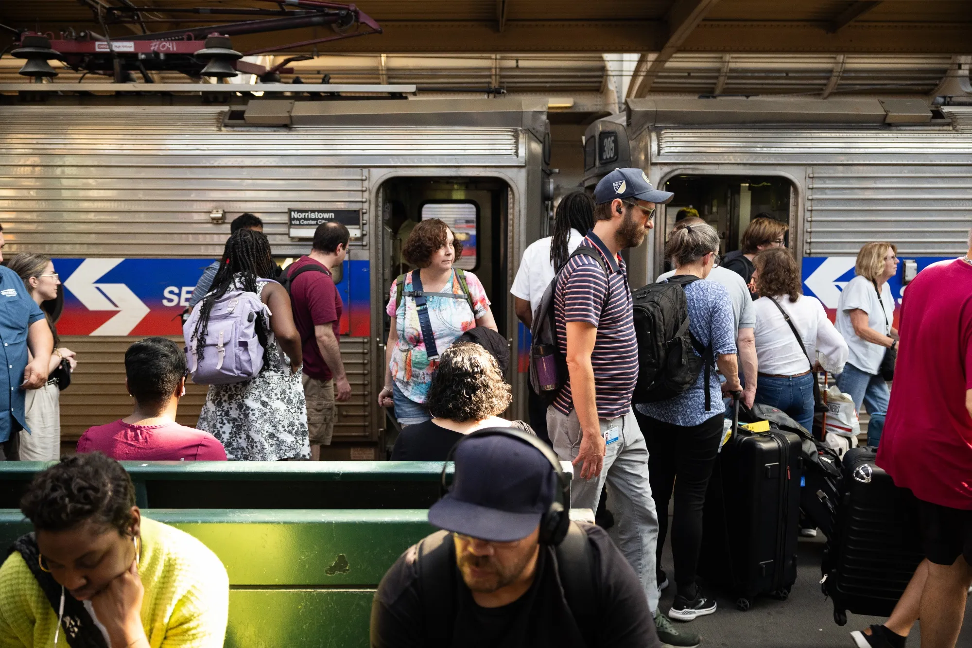 Commuters on a SEPTA train platform at 30th Street Station in Philadelphia on Aug. 11.