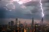 CHICAGO, IL - JUNE 12: Lightning strikes the Willis Tower (formerly Sears Tower) in downtown on June 12, 2013 in Chicago, Illinois. A massive storm system with heavy rain, high winds, hail and possible tornadoes is expected to move into Illinois and much of the central part of the Midwest today. (Photo by Scott Olson/Getty Images)