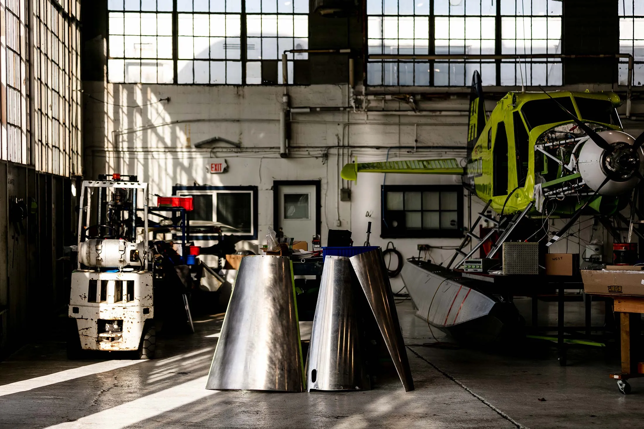 Converted nose cones for Harbour Air’s all-electric e-plane inside an aircraft maintenance hangar at Vancouver International Airport’s South Terminal on Oct. 30. With 42 aircraft, the carrier operates the largest all-seaplane fleet in North America.