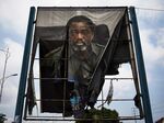 A burned billboard of Congo’s then outgoing President Joseph Kabila in January 2019.