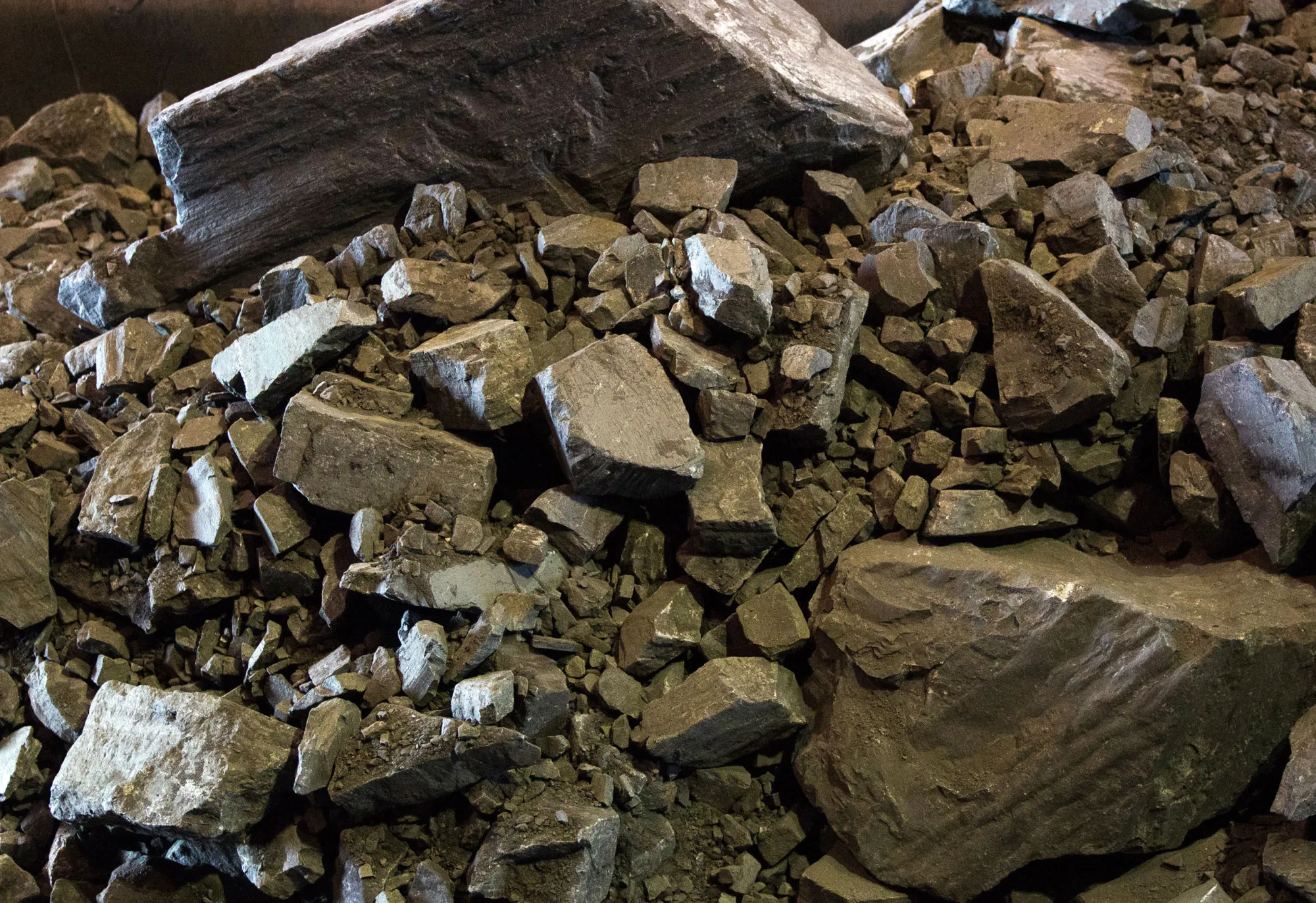Iron ore rock sits in a cargo wagon before processing at the Stoilensky GOK (SGOK) iron ore mine and processing plant operated by OAO Novolipetsk Steel, also known as NLMK, in Stary Oskol, Russia, on Friday, Sept. 26, 2014. Novolipetsk Steel regained its ranking as the world's most profitable major steelmaker after the biggest Russian producer by domestic output cut costs, Bloomberg reported Aug. 7.
