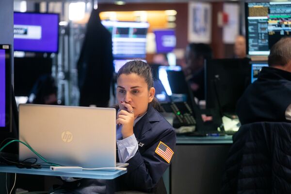 A trader works on the floor of the New York Stock Exchange (NYSE) in New York, US,