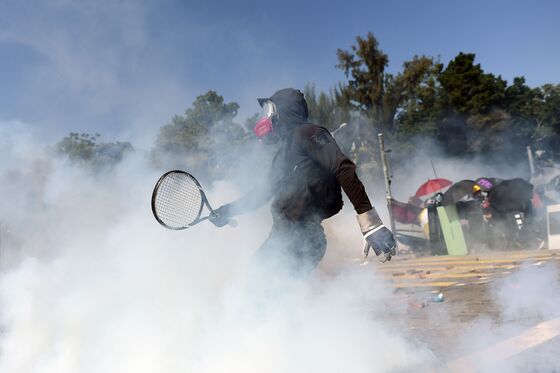 Water Cannon Fails to Move Holed-Up Protesters