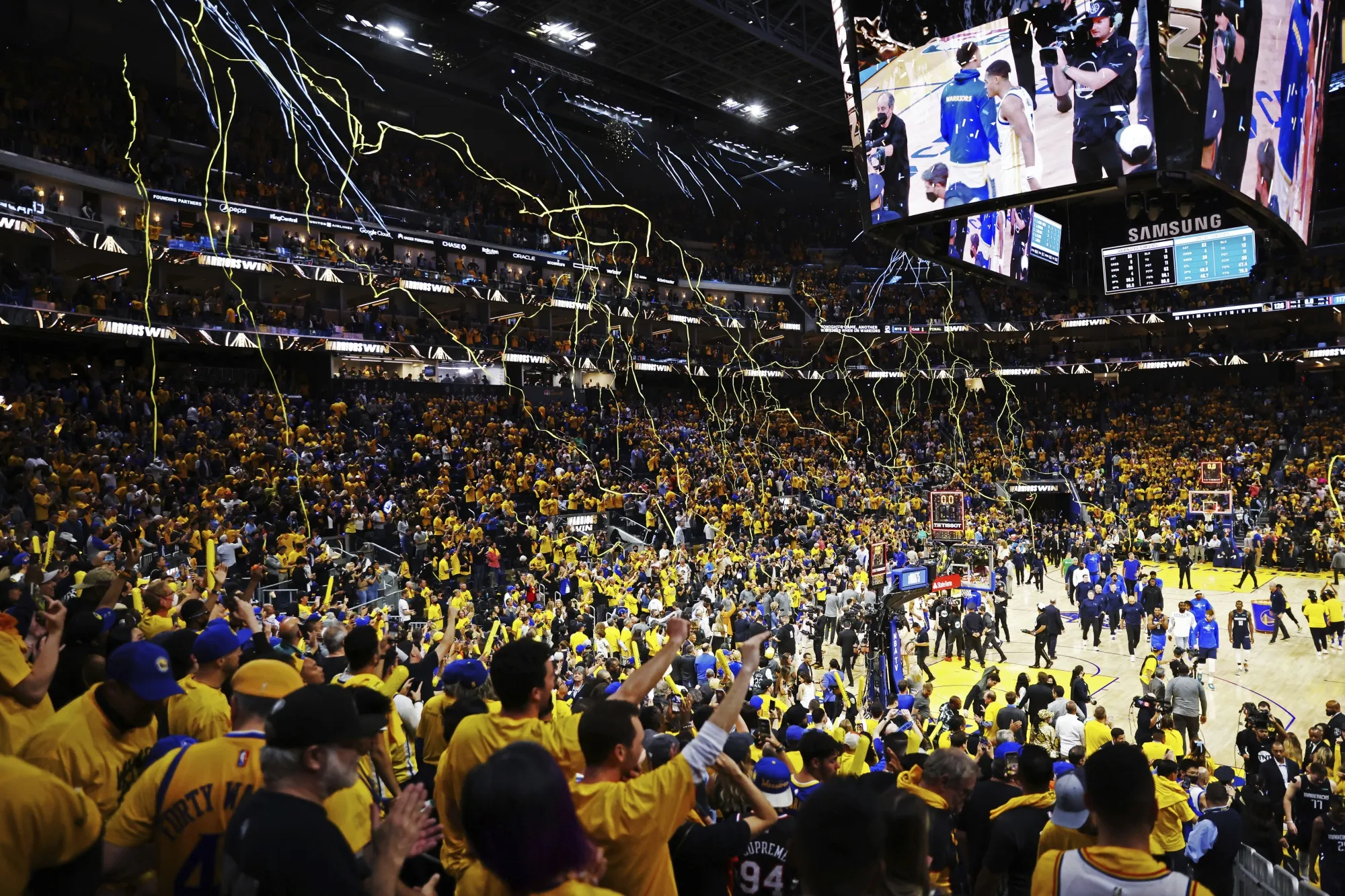 Streamers fill Chase Stadium after the Golden State Warriors Game 2 of the Western Conference Finals where they defeated the Dallas Mavericks at Chase Center on Friday, May 20, 2022 in San Francisco. The score was 126-117. (Gabrielle Lurie/San Francisco Chronicle via AP)