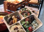 Users of the treatsure food-rescue app buy discounted buffet-in-a-box meals from Singapore hotel chains.