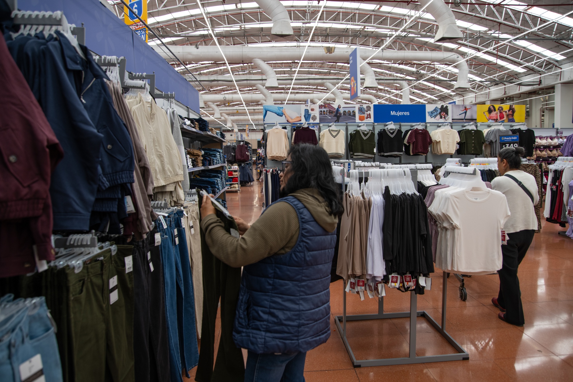 Shoppers browse clothing at a store in Mexico City on Aug. 20.