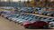 2016 Chevrolet Camaros sit parked outside before being shipped to dealers from the General Motors Co. (GM) Lansing Grand River Assembly plant in Lansing, Michigan, U.S., on Monday, Oct. 26, 2015. General Motors Co. and the United Auto Workers reached a tentative four-year agreement that is expected to provide raises across the board, averting a potential strike. Photographer: Jeff Kowalsky/Bloomberg
