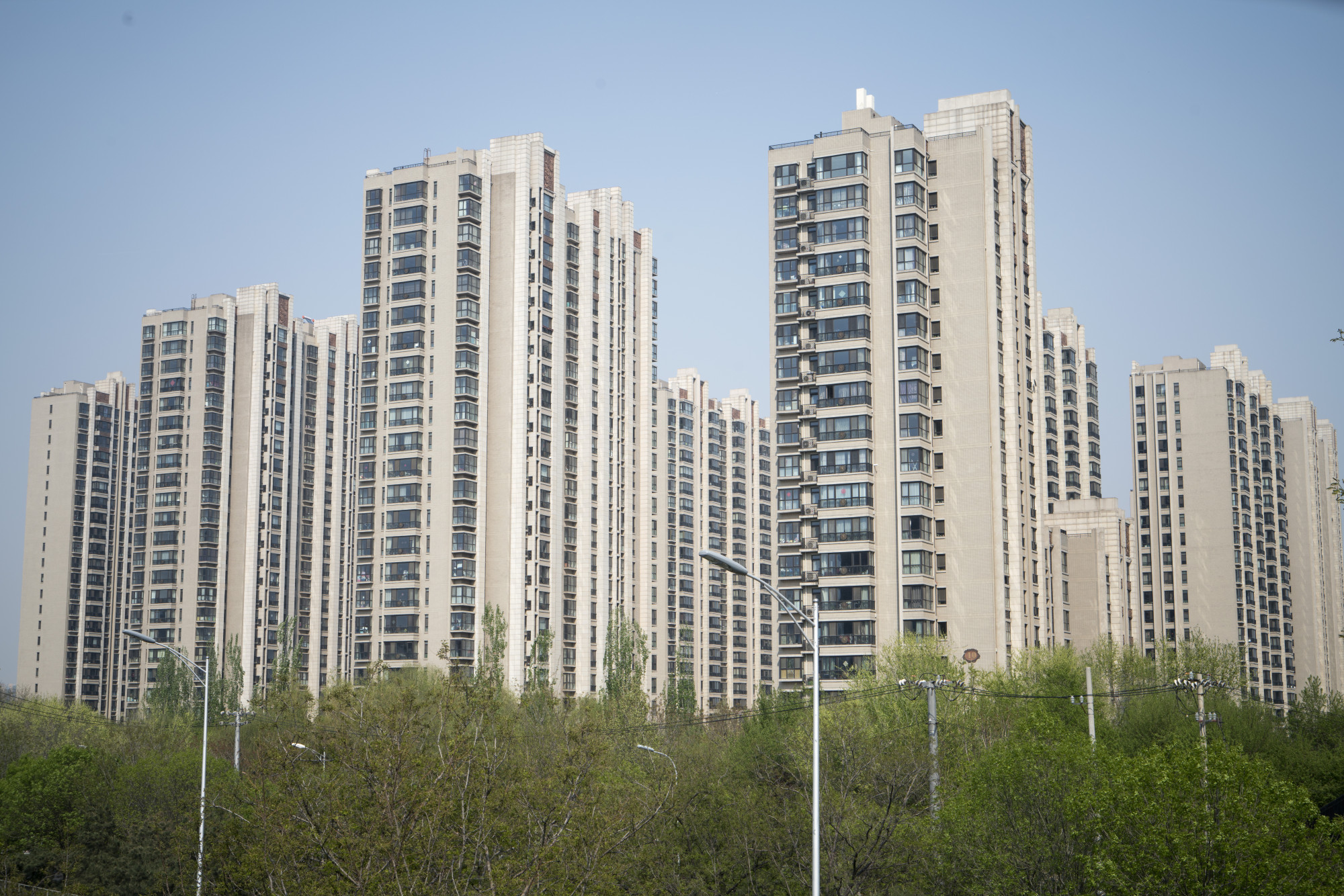 China Home Price Growth Slowest in Five Months as Curbs Bite Bloomberg