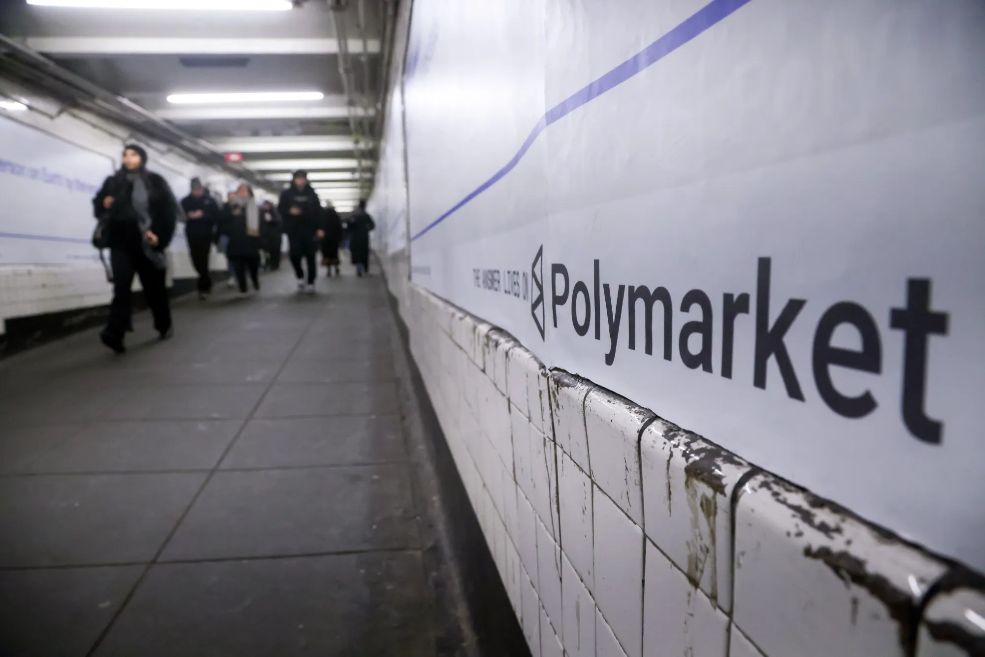 A Polymarket advertisement in a subway station in New York.
