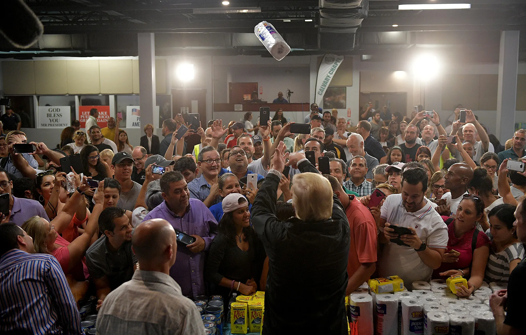 Donald Trump passes out paper towels in Guaynabo, Puerto Rico on Oct. 3, 2017.