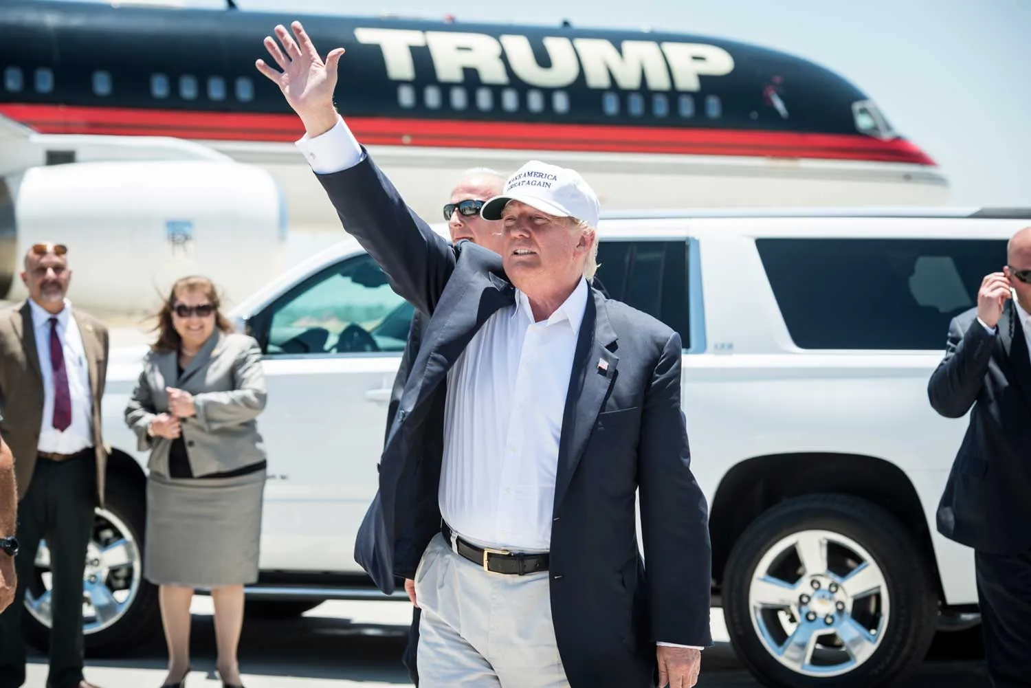 LAREDO, TEXAS - JULY 23: Republican Presidential candidate and business mogul Donald Trump exits his plane during his trip to the border on July 23, 2015 in Laredo, Texas. Trump's recent comments, calling some immigrants from Mexico as drug traffickers and rapists, have stirred up reactions on both sides of the aisle. Although fellow Republican presidential candidate Rick Perry has denounced Trump's comments and his campaign in general, U.S. Senator from Texas Ted-Cruz has so far refused to bash his fellow Republican nominee. (Photo by Matthew Busch/Getty Images)
