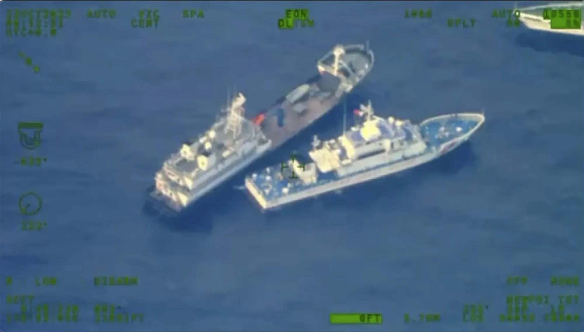 The image released by the Armed Forces of the Philippines&nbsp;show a Chinese vessel and Philippine coast guard vessel at the disputed South China Sea on Oct. 22.