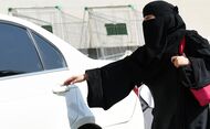 A Saudi woman gets into a taxi at a mall in Riyadh as a grassroots campaign planned to call for an end to the driving ban for women in Saudi Arabia on October 26, 2014. Amnesty International is calling on the Saudi Arabian authorities to respect the right of women to defy the ban by driving this weekend and to end the harassment of supporters of the campaign.    AFP PHOTO/FAYEZ NURELDINE        (Photo credit should read FAYEZ NURELDINE/AFP/Getty Images)