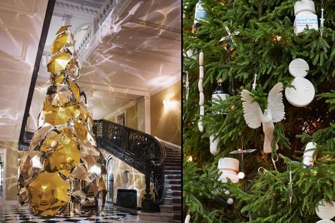Claridge's 2015 Christmas tree designed by Burberry's Christopher Bailey (left). At the Connaught, Damien Hirst designed the ornaments.