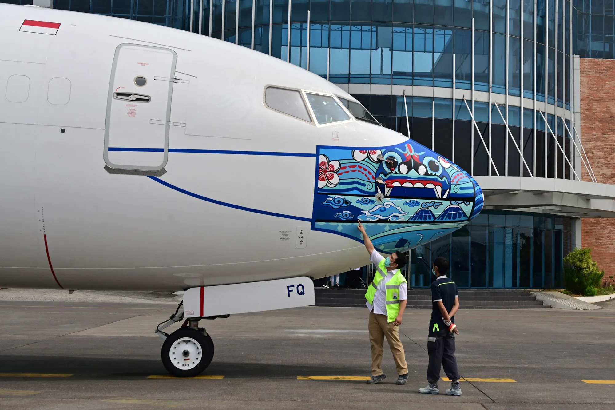 An aircraft with&nbsp;a new design&nbsp;to promote&nbsp;wearing face masks in Tangerang on Oct. 12.&nbsp;
