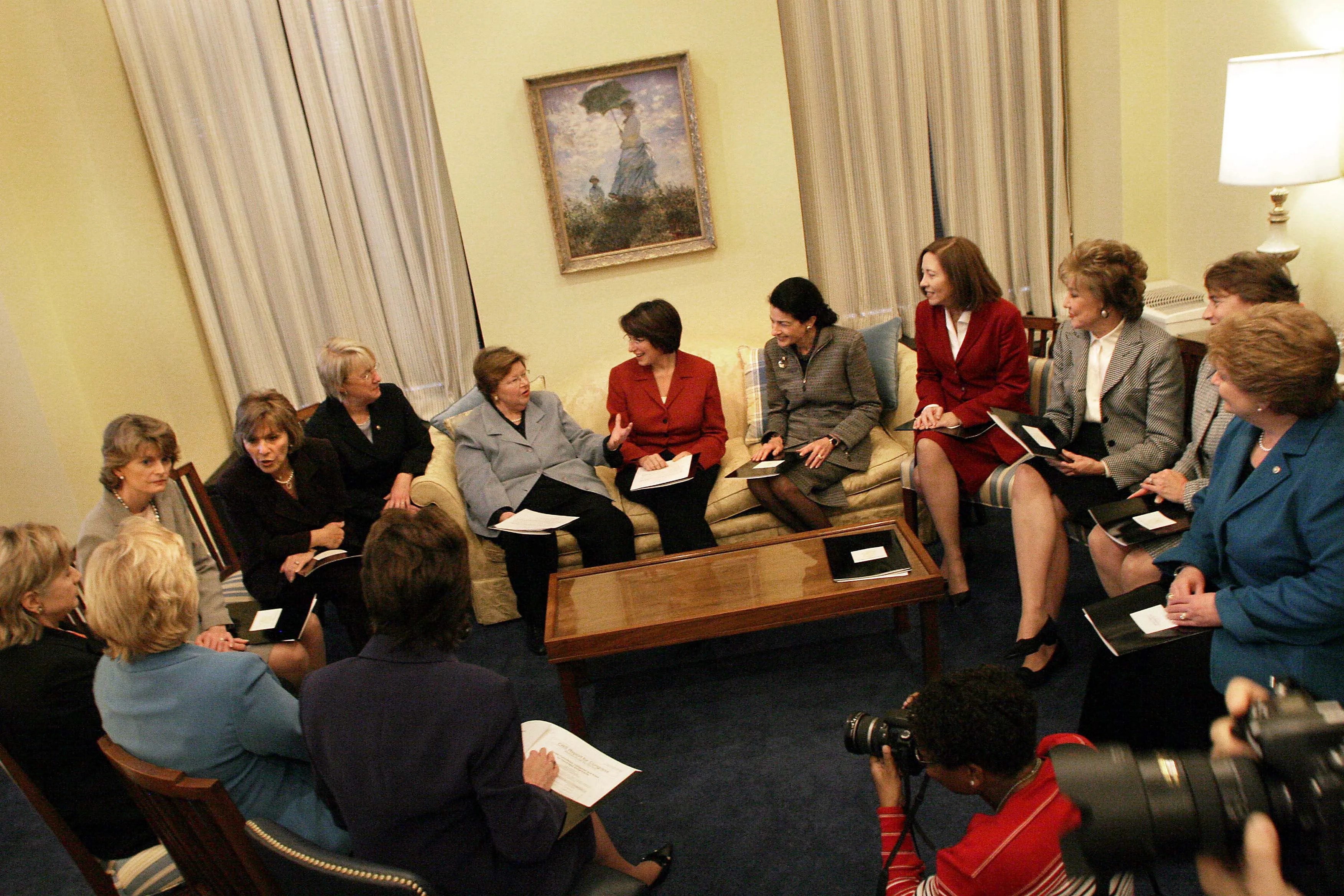 Women senators (seated in circle from left to right) Sen Susan Collins (R-Maine) Sen Mary Landrieu (D-LA); Sen Hillary Clinton (D-NY) Sen Lisa Murkowski (R-Alaska); Sen Barbara Boxer (D-California) Sen Patty Murray (D- Washington) Sen Barbara Mikulski (D-MD) Incoming Sen Amy Klobuchar(D-Minn) Sen Olympia Snowe R-Maine); Sen Maria Cantwell (D-Wash) Sen Elizabeth Dole (R-NC) Sen Blanche Lincoln (D-Ark) and Sen Debbie Stabenow (D-Mich) in Sen Mikulski's office at the US Capitol Washington, D.C. , Tuesday,November 14, 2006. Photographer:David Scull/BloombergNews
