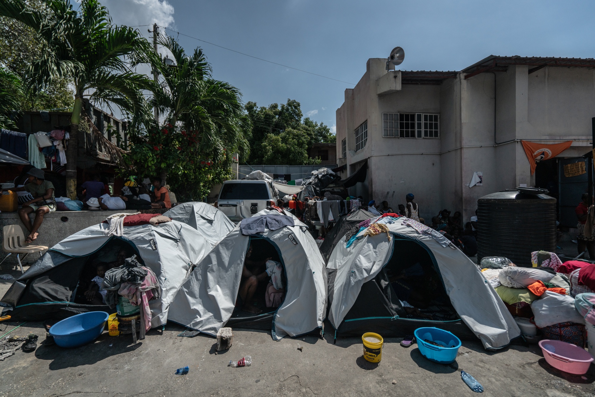 Residents set up a new displacement camp in Port-au-Prince, Haiti on Sept. 14.