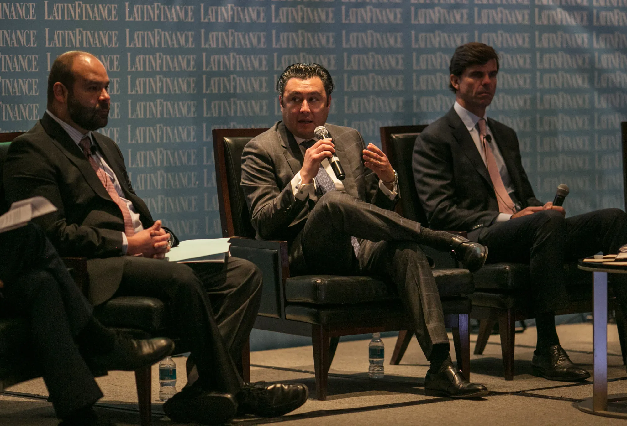 Sergio Camacho, chief financial officer of Unifin Financiera SAB, center, speaks during the 13th Annual Mexican Financial Summit in Mexico City, Mexico, on Wednesday, Feb. 21, 2018.&nbsp;