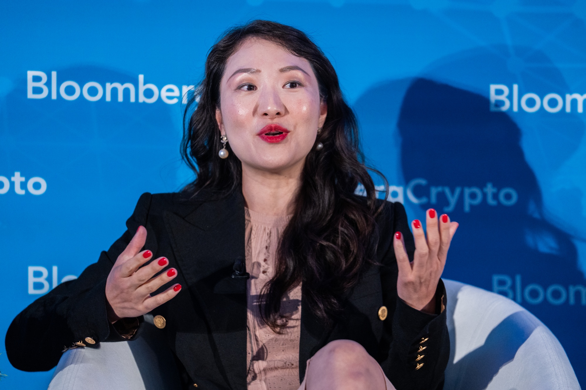 Helen Hai, CEO&nbsp;of the Binance Charity Foundation, speaks during the Bloomberg Crypto Summit in New York on July 19.