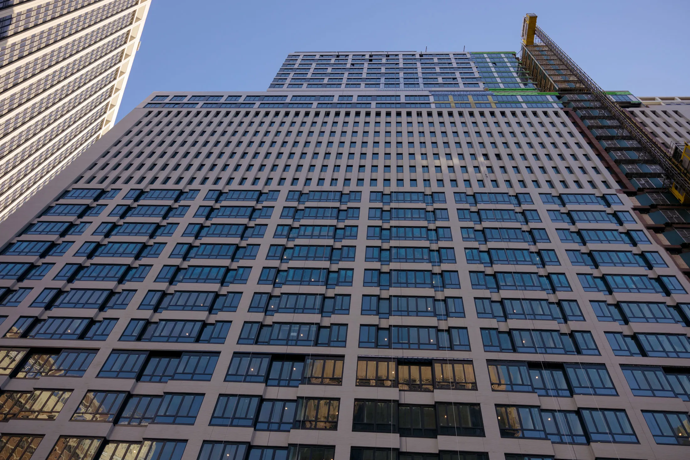 A JPMorgan Chase &amp; Co. former office building has been revamped and rebranded as a residential tower.