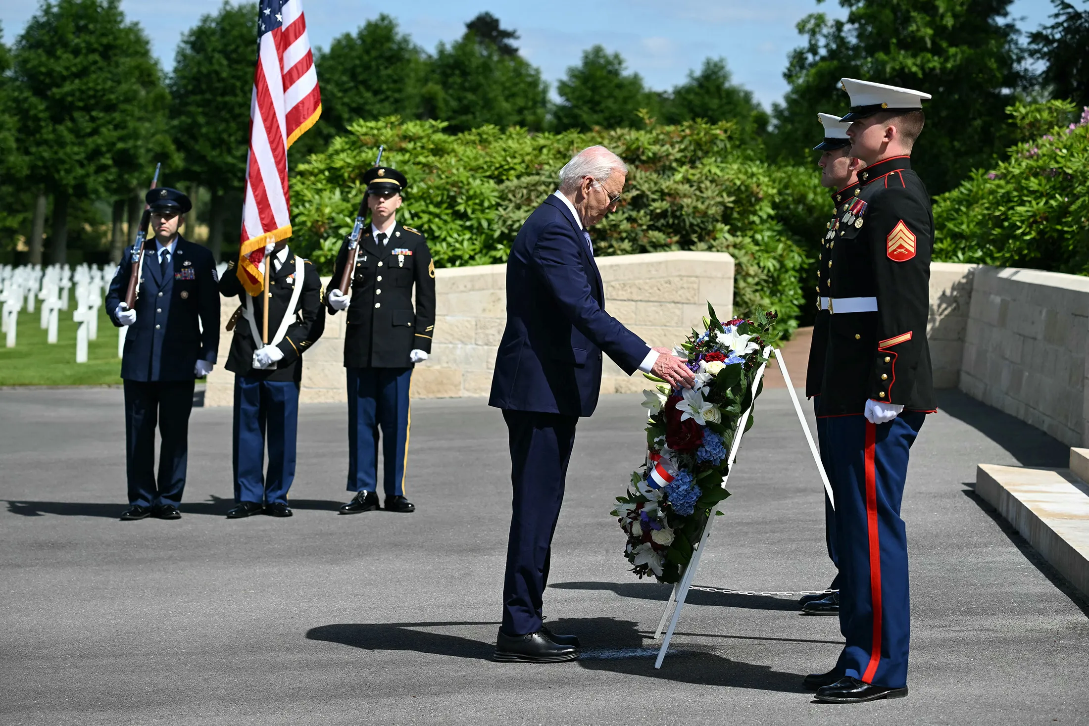 Biden participates in a wreath laying ceremony at the Aisne-Marne American Cemetery in Belleau, Northern France, on June 9.