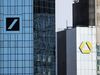 The logos of Deutsche Bank AG, left, and Commerzbank AG sit on the banks' headquarters in Frankfurt, Germany, on Monday, March 18, 2019. Rothschild & Co. and Goldman Sachs Group Inc. are advising Commerzbank on its merger talks with Deutsche Bank, according to people familiar with the matter.