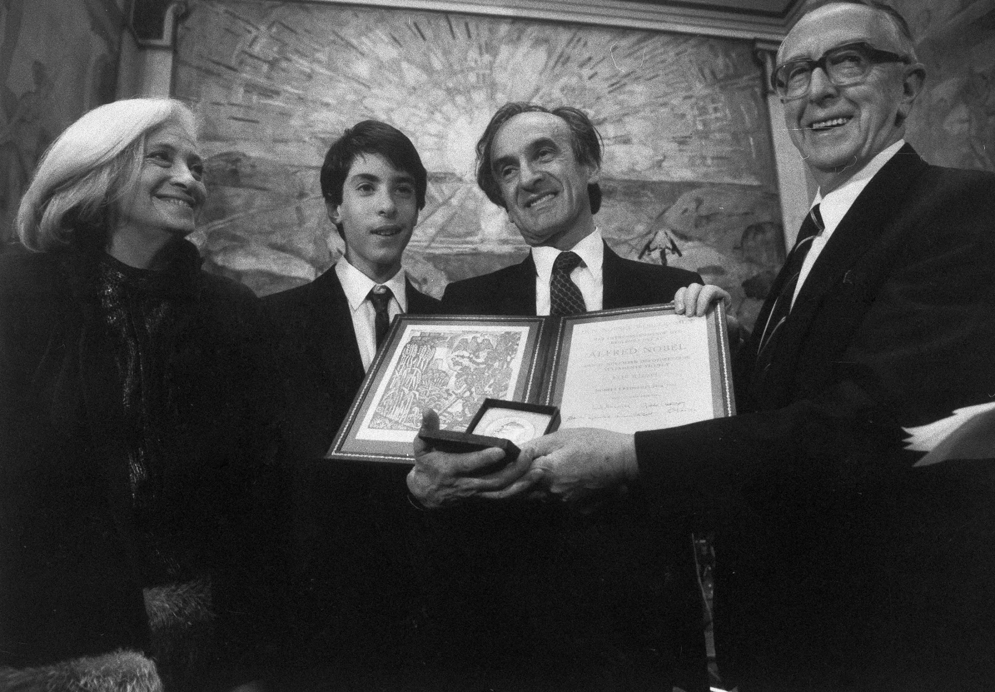 Chairman of the Nobel Peace Prize Committee Egil Aarvik, from right, with Peace Prize winner Elie Wiesel, his son Elisha, and wife Marion, after Wiesel received the award, Dec. 10, 1986.
