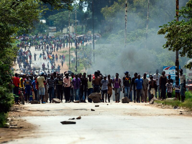 Protesters demonstrate against rising fuel prices near Harare in January.