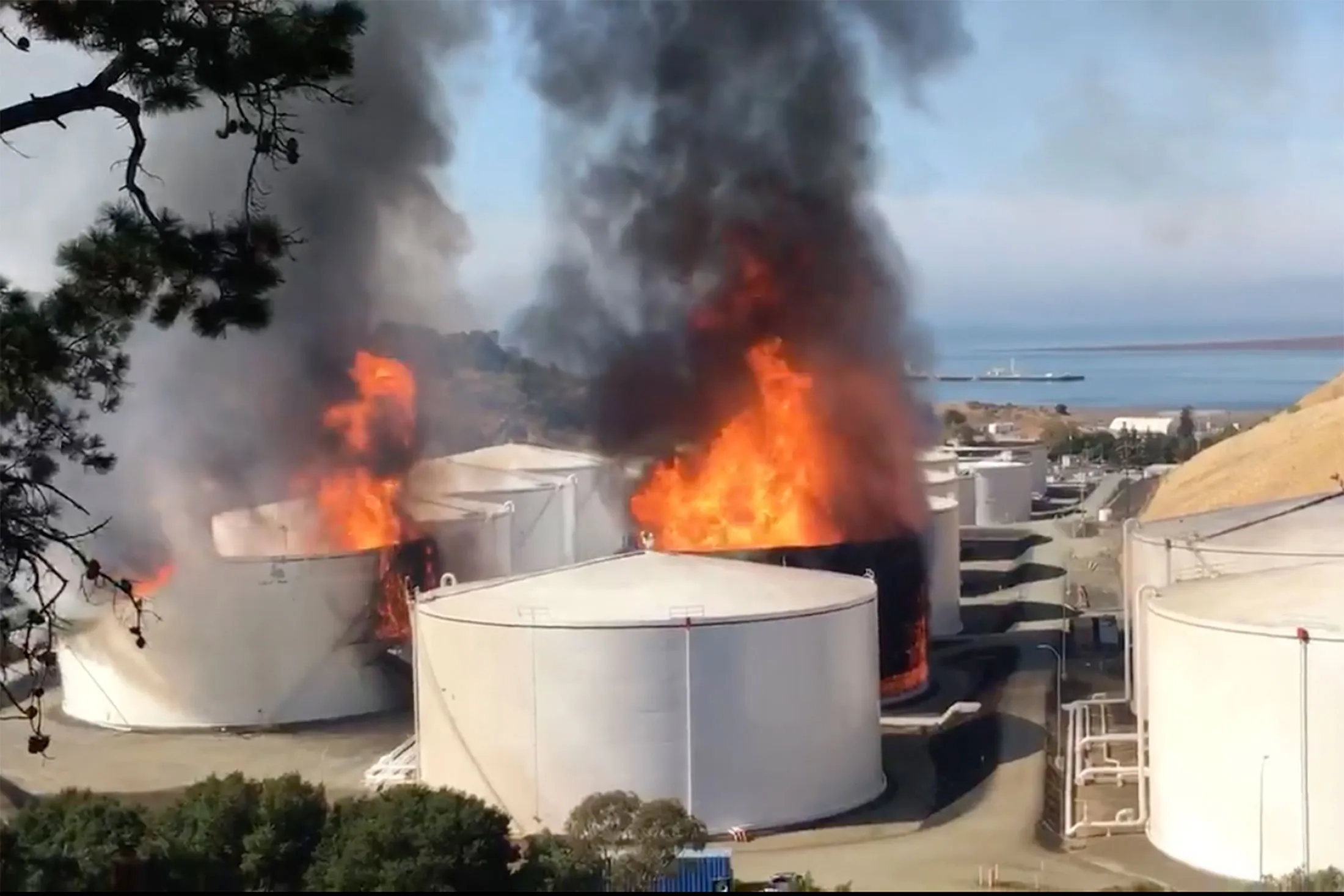 A still frame from a video shows tanks on fire at an oil storage facility&nbsp;in Rodeo, Calif. on Oct. 15.