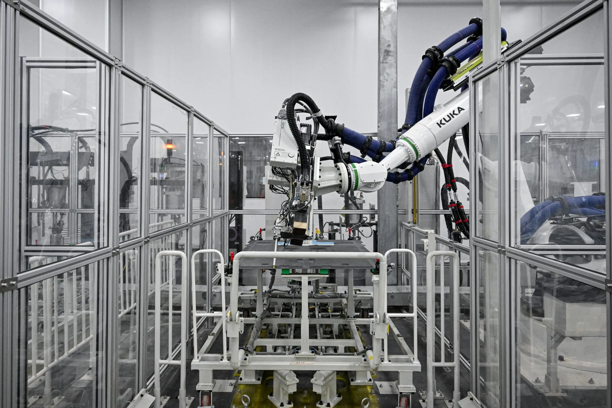 A robotic arm on an electric flying car production line in Guangzhou.