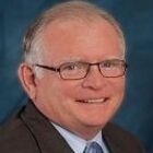 Headshot of John P Friel