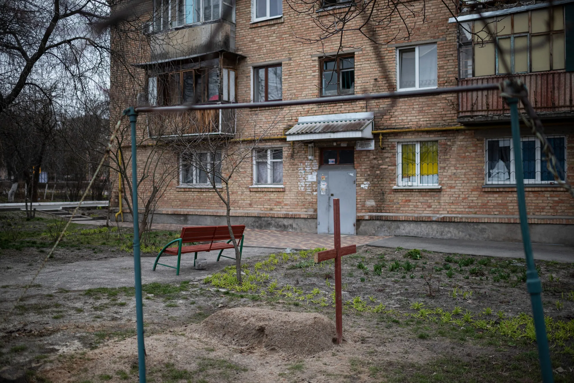 A grave of a local resident by an apartment building, in Bucha, Ukraine, on April 5.