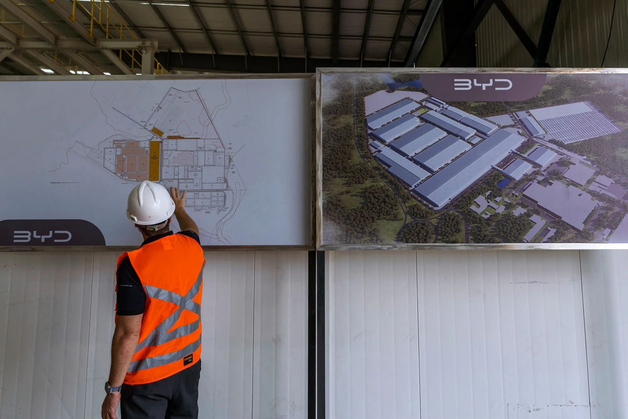 Blueprints and a rendering for the BYD Brazil factory under construction in Camacari, Brazil, on Jan. 10. The factory will be BYD’s first electric vehicle plant outside Asia.