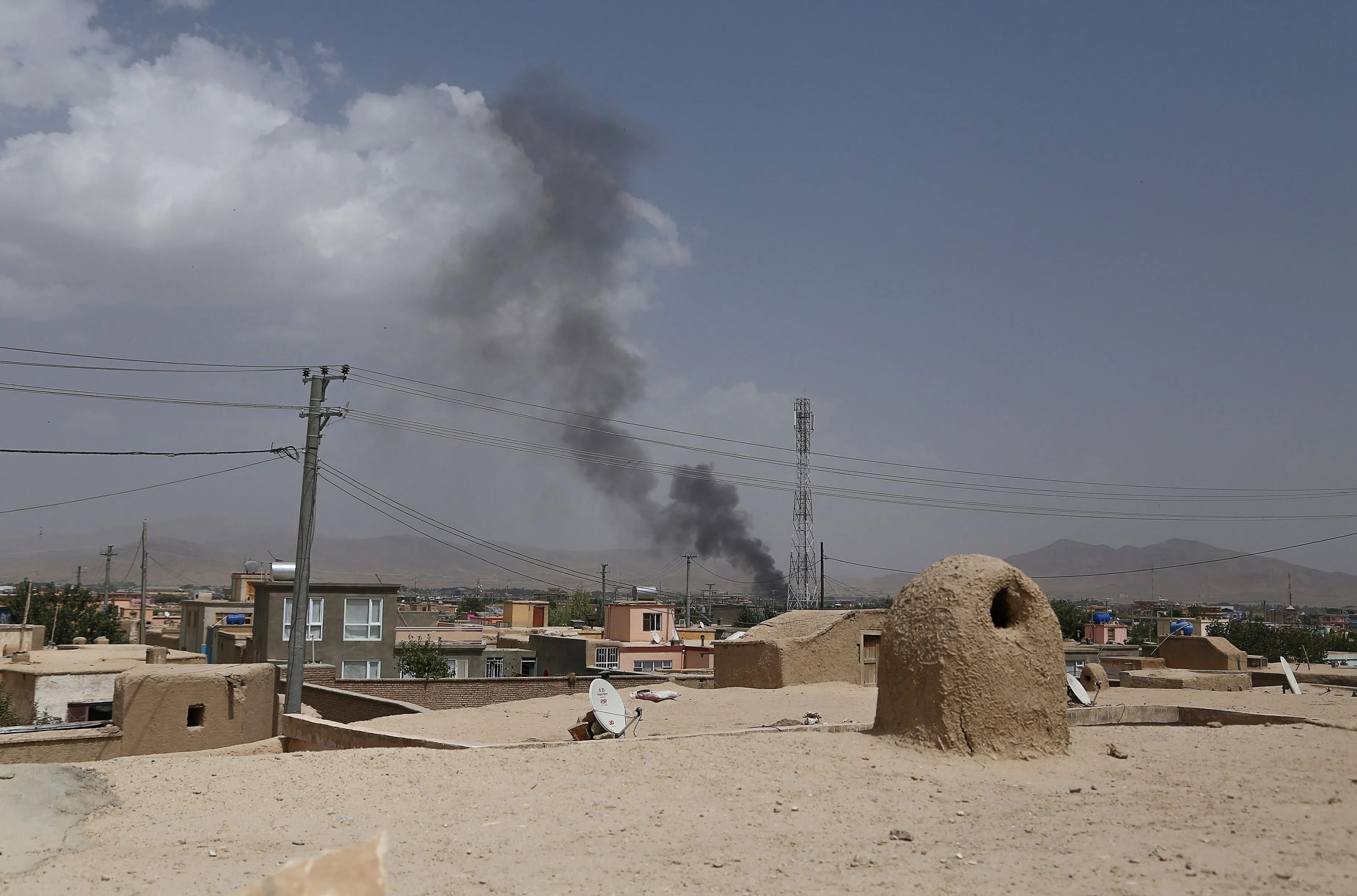 Smoke rising into the air after Taliban militants launched an attack on Ghazni on Aug. 10.