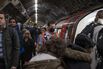 London Workers Wear Face Masks As U.K. Virus Cases Expected To Grow